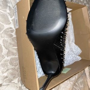 Black,spike,leather back zipper